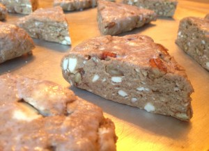 Those light-colored flecks are large chunks of butter. That translates into fluffy deliciousness later!